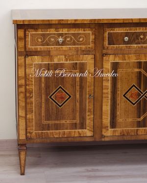 Handcrafted sideboard made of solid wood and richly inlaid in walnut and olive wood in neo-classical style